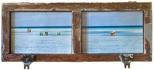 055 - Enrico-De-Santis - Donne-di-mare - 45x110-cm - Fotografia-stampata-su-tela-e-incorniciata-su-porta-cella-frigorifera-pescherecci